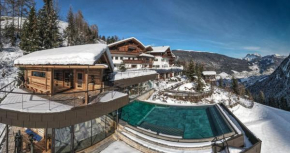 Charmehotel Uhrerhof - Deur Ortisei